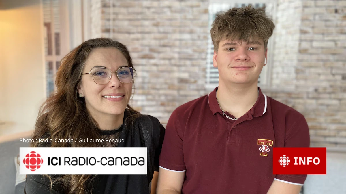 Élisabeth Nadeau et Ok8 Daigle utilisent l'application « Move Then Play » à la maison.